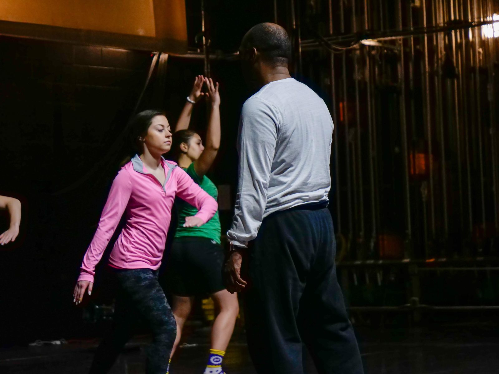 Boris Willis walking the spacing with a dancer, others moving behind them
