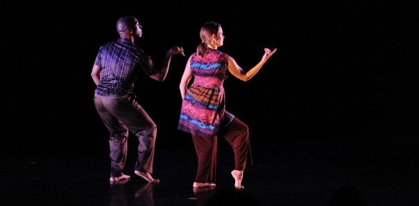 Boris Willis and Cynthia McLaughlin gesturing toward one another